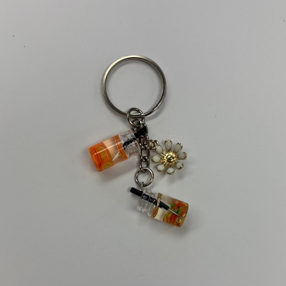 Orange and Gold Keychain with Flower Charm